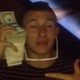 Illustration for article titled Johnny Manziel Does The Money Phone Very Poorly
